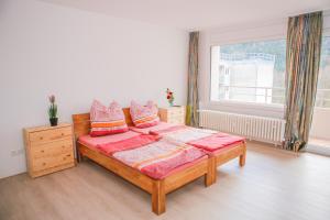 Ένα ή περισσότερα κρεβάτια σε δωμάτιο στο 4-Zimmer-Wohnung 126