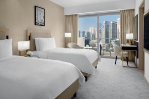 Uma cama ou camas num quarto em JW Marriott Hotel Marina