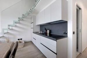 Kuchyň nebo kuchyňský kout v ubytování Le Coccinelle Home a Lierna