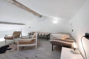 Postel nebo postele na pokoji v ubytování Le Coccinelle Home a Lierna