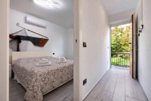 Postel nebo postele na pokoji v ubytování Le Coccinelle Home a Lierna