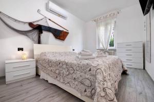 Postel nebo postele na pokoji v ubytování Le Coccinelle Home a Lierna