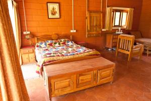 Un pat sau paturi într-o cameră la Kabbe Hillview Homestay