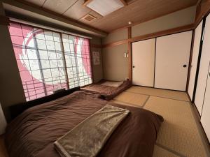 Letto o letti in una camera di Hotel EL 8（宇都宮駅東口）