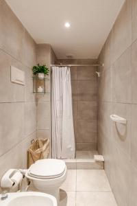 Ένα μπάνιο στο Mi Lugar en Rosario 2 - Loft céntrico VIP con cochera opcional