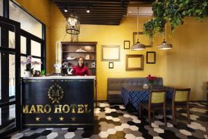Certifikát, hodnocení, plakát nebo jiný dokument vystavený v ubytování Maro Hotel & Apartment