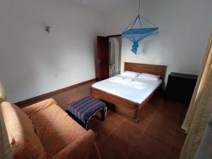 Postel nebo postele na pokoji v ubytování S and P Airport transit hostel and villa 01