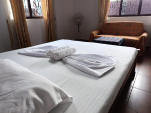 Postel nebo postele na pokoji v ubytování S and P Airport transit hostel and villa 01