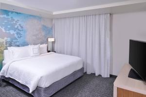 Postel nebo postele na pokoji v ubytování Courtyard by Marriott Columbus Grove City