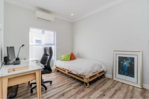 Postel nebo postele na pokoji v ubytování Val de Vie