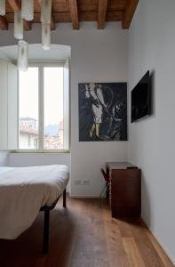 TV a/nebo společenská místnost v ubytování "Camera Con Vista" Bergamo Alta