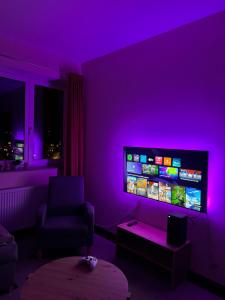 TV i/ili multimedijalni sistem u objektu Apartment Residence Moser - Sauna and Pool