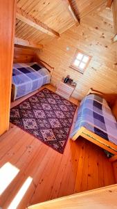 Postel nebo postele na pokoji v ubytování Etno dom Bubalo