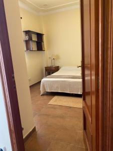 Postel nebo postele na pokoji v ubytování Disconnection and comfort in nature Your stay in the Lemon Room