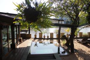 Zahrada ubytování Tolani Riverside Villa