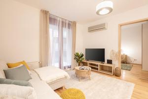 TV a/nebo společenská místnost v ubytování Léda Private Apartment