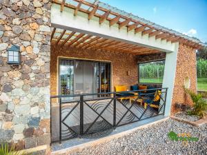 a patio of a house with a deck at Ivy Homes - Kapchorwa in Kapchorwa