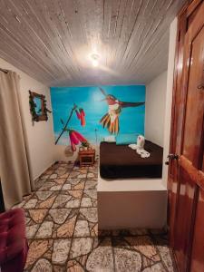 Postel nebo postele na pokoji v ubytování Boho by Arte Hostal Boquete