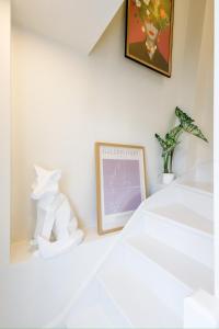 Ένα ή περισσότερα κρεβάτια σε δωμάτιο στο Lovely Duplex