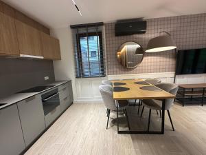 Kuchyňa alebo kuchynka v ubytovaní Villa Monica Apartamenty