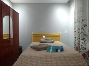 Postel nebo postele na pokoji v ubytování Pousada Lar do Sossego