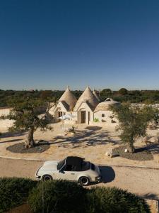 Φωτογραφία από το άλμπουμ του Trulli del Conte Luxury Holiday σε Castellana Grotte