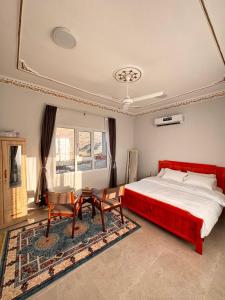 Postel nebo postele na pokoji v ubytování Suhail Star Guest House