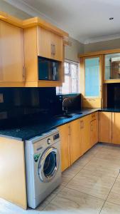 Kuchyň nebo kuchyňský kout v ubytování Imizamo Accommodation