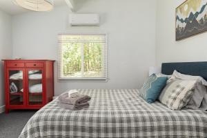 Voodi või voodid majutusasutuse Bluebird Cabin toas