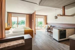 Postel nebo postele na pokoji v ubytování Hosler + 22 fotografií