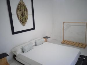Postel nebo postele na pokoji v ubytování L2B - São Vicente