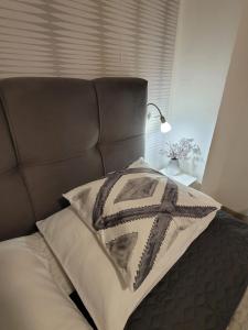 Postel nebo postele na pokoji v ubytování Apartments Lanterna Ražanac