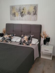 Postel nebo postele na pokoji v ubytování Apartments Lanterna Ražanac