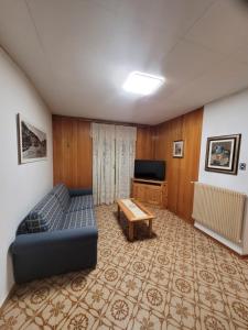 TV a/nebo společenská místnost v ubytování Casa Pontesana