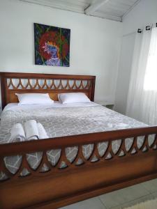 En eller flere senge i et værelse på La Peregrina - Bangalô Superior