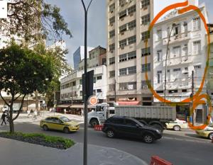 a view of a city street with cars and buildings at Suíte 101 - Pousada no Centro do Rio in Rio de Janeiro