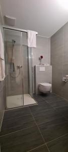 Koupelna v ubytování Hotel Garni