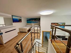Μια τηλεόραση ή/και κέντρο ψυχαγωγίας στο Bel Mare Apartment 1