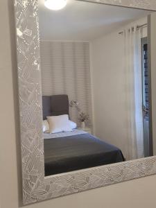 Postel nebo postele na pokoji v ubytování Apartments Lanterna Ražanac
