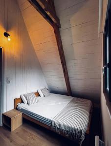 Postel nebo postele na pokoji v ubytování Le ChAlet N5