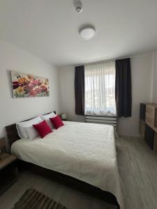 Postel nebo postele na pokoji v ubytování Vidik Residence A23
