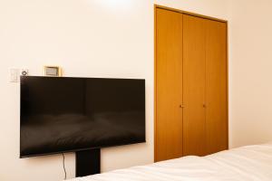 Willow Heimにあるテレビまたはエンターテインメントセンター