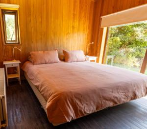 Postel nebo postele na pokoji v ubytování Casas Martín Pescador, Lago Huillinco, Chiloe
