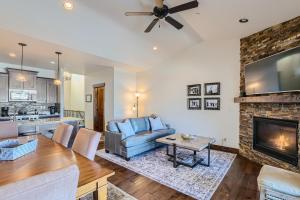 a living room with a couch and a fireplace at Private Hot Tub, Close to Resorts - Private Hot Tub - Close to PC, Mountain Mansion Family Getaway in Park City