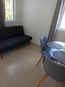 Posezení v ubytování bonito estudio para disfrutar casa palmeras