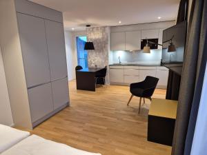 Kuchyň nebo kuchyňský kout v ubytování CENTRINO Apartments