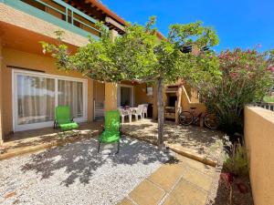 Κήπος έξω από το Appart plain-pied 4 pers - piscine - parking