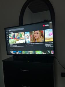 TV a/nebo společenská místnost v ubytování La casa de la H, entre pinos