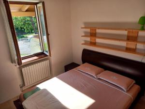 Postel nebo postele na pokoji v ubytování Casa al Mas