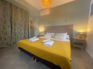 Postel nebo postele na pokoji v ubytování Villa Jalna Zamana 2 chambres piscine privée jardin
